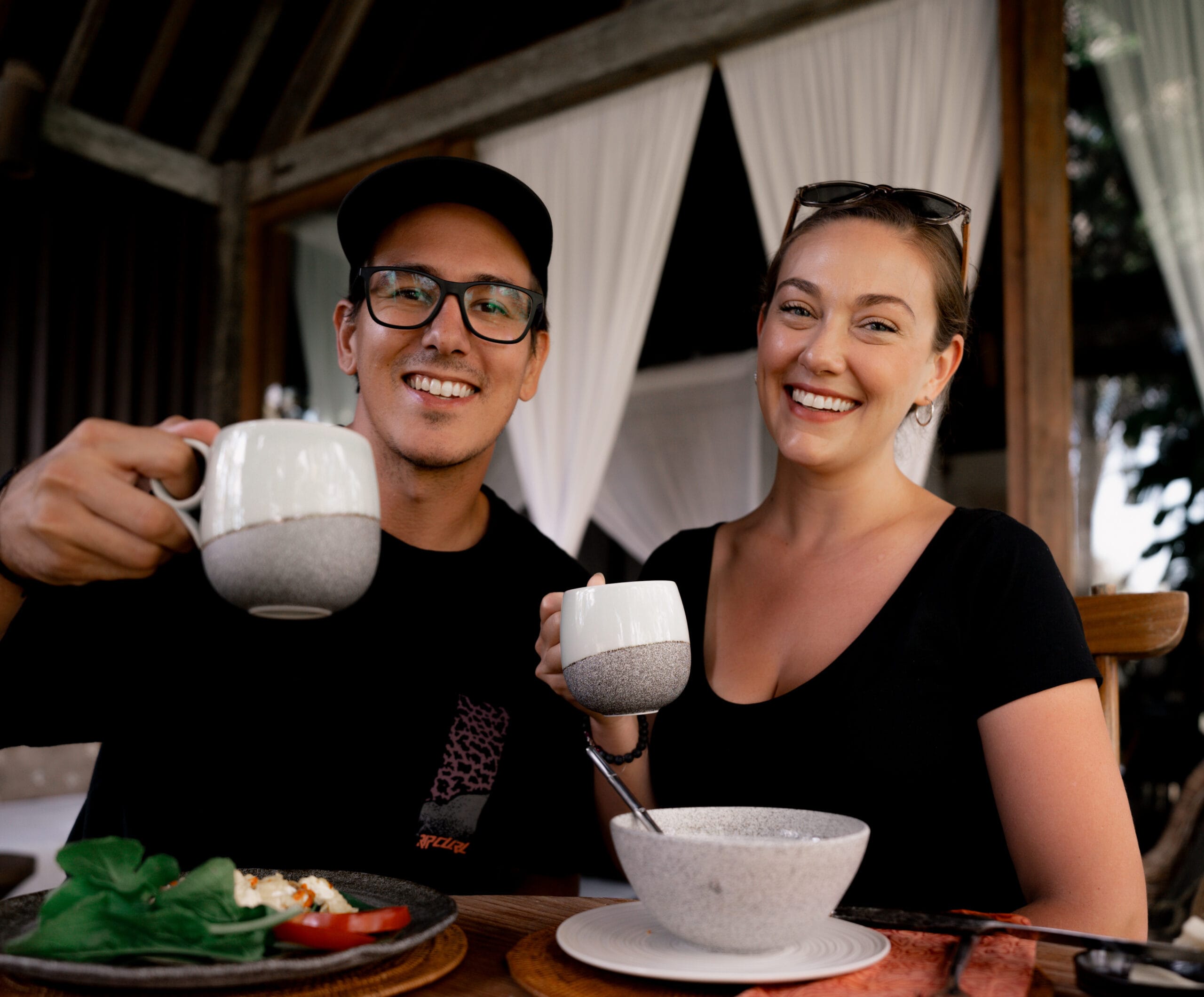 Photo of Mike and Ashley holding coffee cups